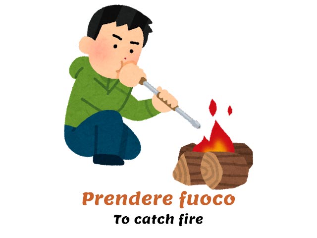 prendere fuoco - to catch fire in italian - man lighting up a fire with wood pieces